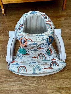 Fisher-Price Portable Baby Chair Sit-Me-Up Floor Seat with Developmental Toys & Machine Washable Seat Pad, Rainbow Showers