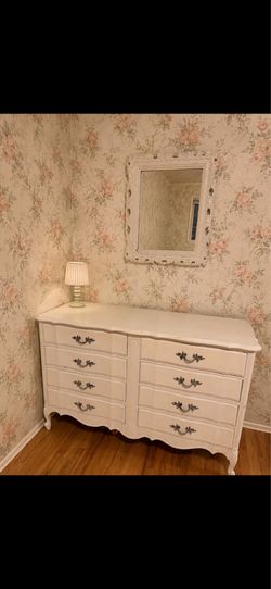 Vintage dresser with mirror and lamp