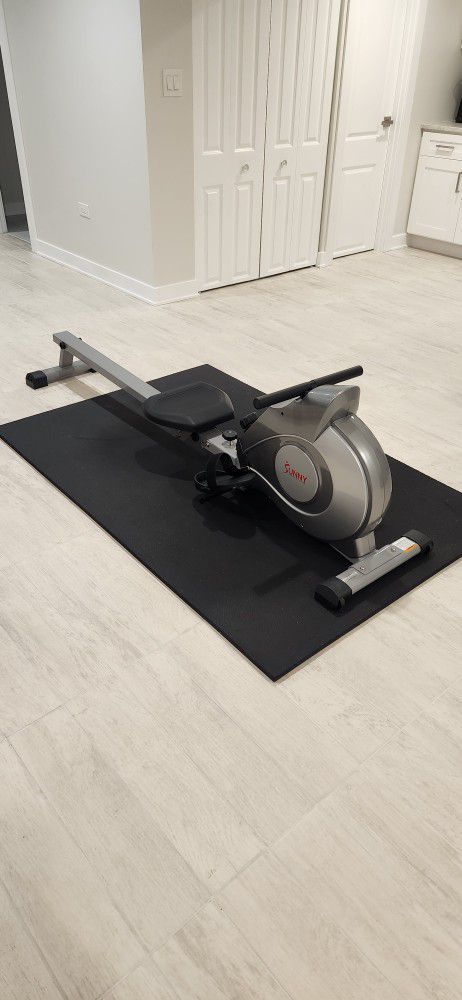 BRAND NEW : Rower and Gym Mat ( Never Used)