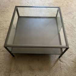 Glass and metal coffee table