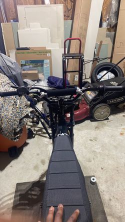Modded Ridstar Q-16 electric bike.All-black color way with 16 x 4 front and rear rims.