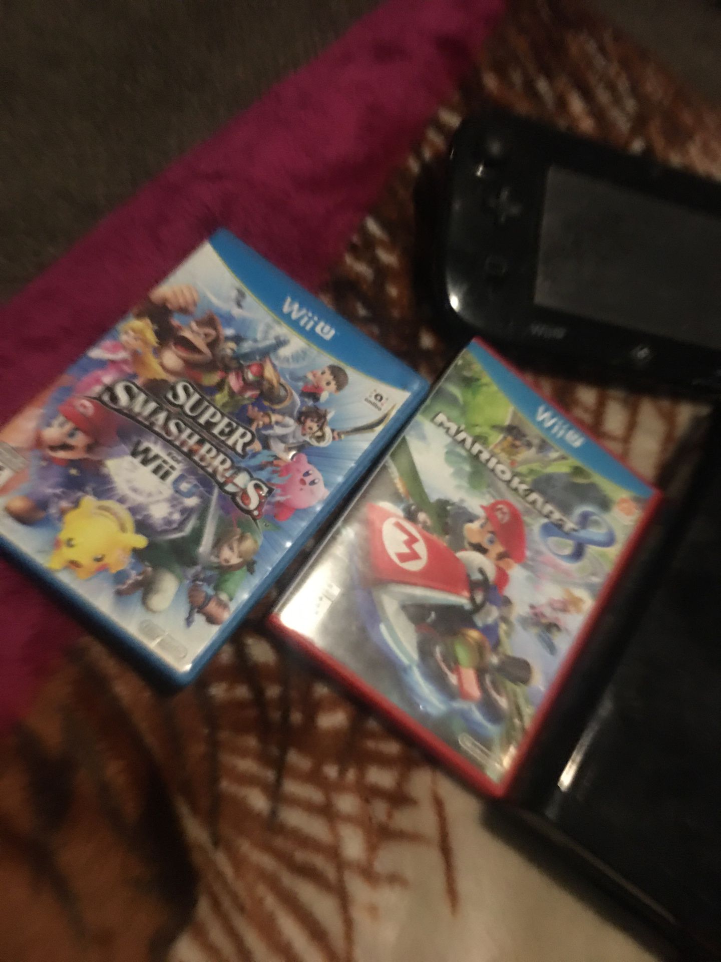 Nintendo Wii U plus 2 games 200$or trades perfect condition
