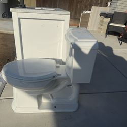 Tub, Toilet , Bathroom Vanity With Sink And Faucet 