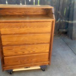 Baby dresser with table that folds out for changing baby