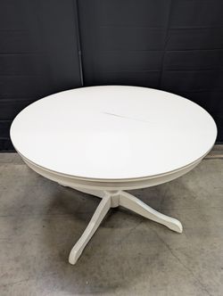 Versatile White Round Pedestal Dining Table
