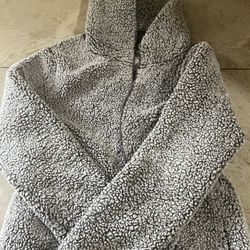 Fuzzy “pink” jacket. 