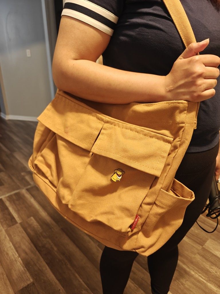 Captain Blues Canvas Messenger Bag - Spacious Crossbody Tote for Men & Women with Multiple Pockets and Adjustable Strap.