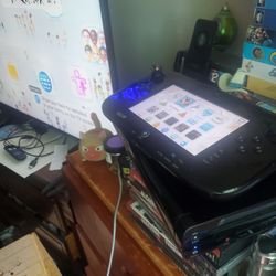 Nintendo Wii U System  & 7 Games 2 Controllers 