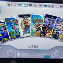 NINTENDO WII + 33 WII GAMES MARIO PARTY,MARIO KART,SUPER MARIO BROS. SUPER SMASH BROS. WII SPORTS and More