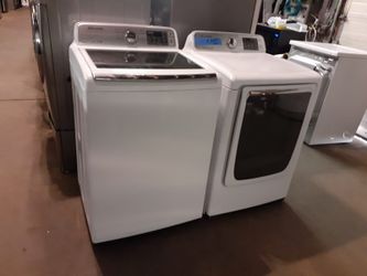 Samsung top load washer and gas dryer set in excellent conditions with 4 months warranty