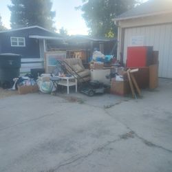 Dump Trailer And Bobcat 