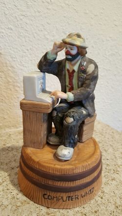 Vintage Emmett Kelly Jr Figurine "Computer Whiz" with stand. This vintage collectible is from flambro