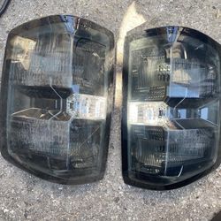 [14-18] [Chevy Silverado/Sierra] Black Smoke As is Scratch Lens Taillights