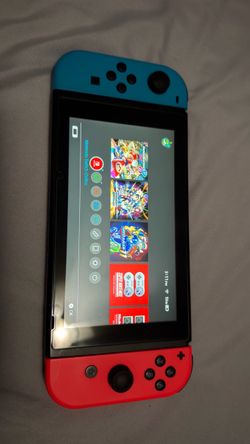 Nintendo Switch with Mario maker and 2 extra joy cons