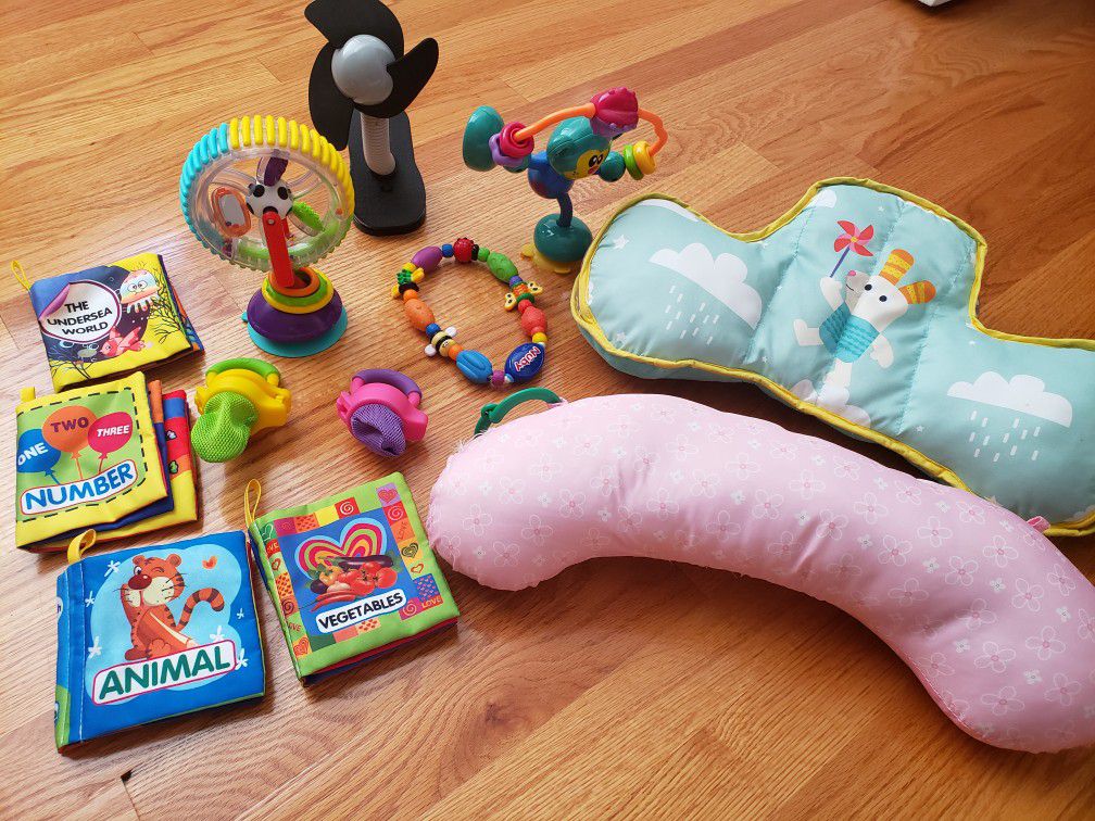 Infant TOYS and more including teething nuby, stroller fan, highchair toys, fruit juicer, and infant cloth books