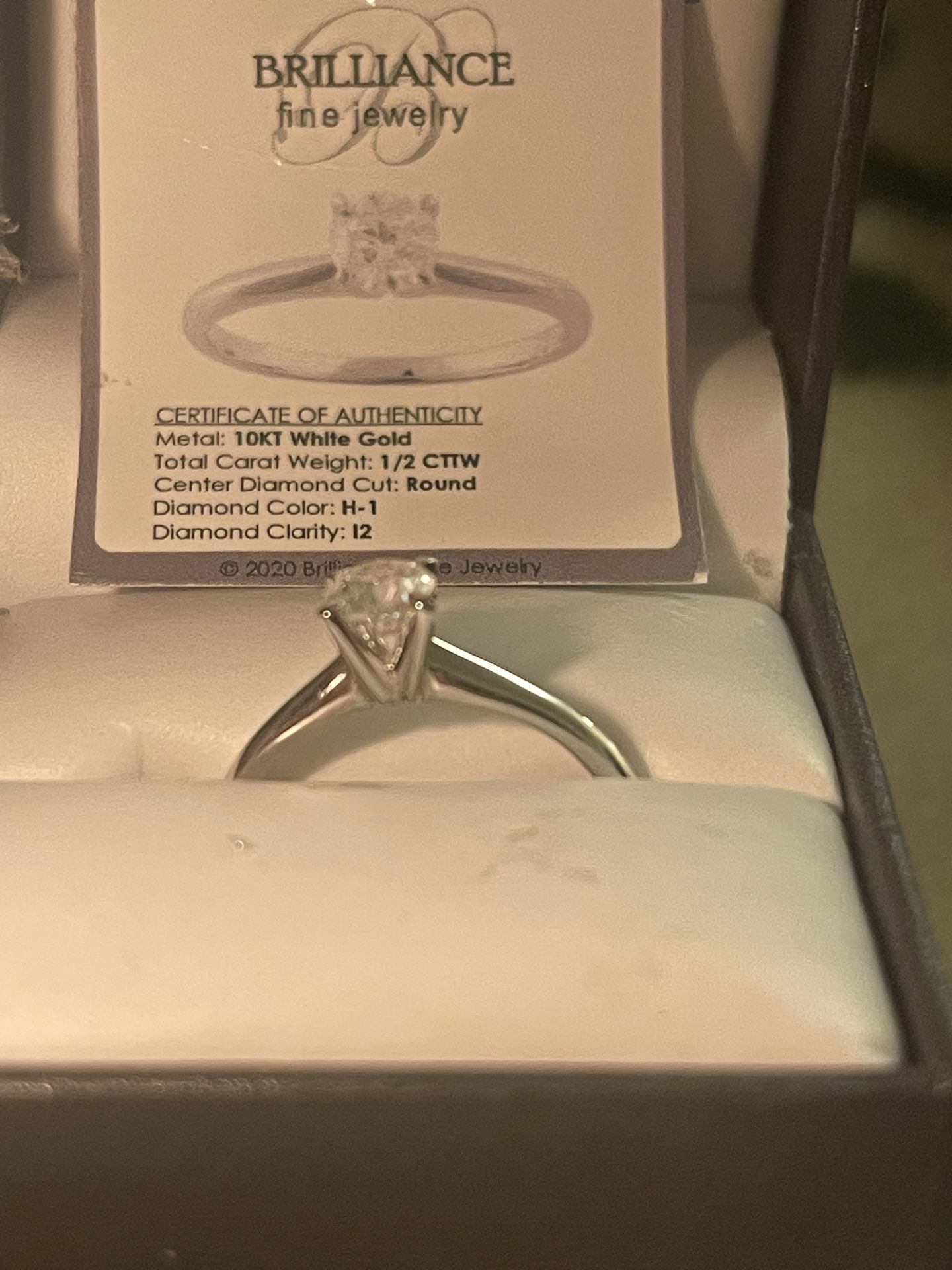 Brand new 1/2ct Tdw Engagement ring set in white gold band