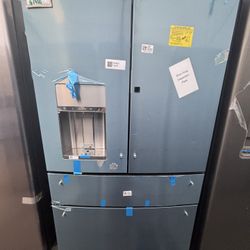 GE Cafe Refrigerator In Stainless Steel With Water And Ice 