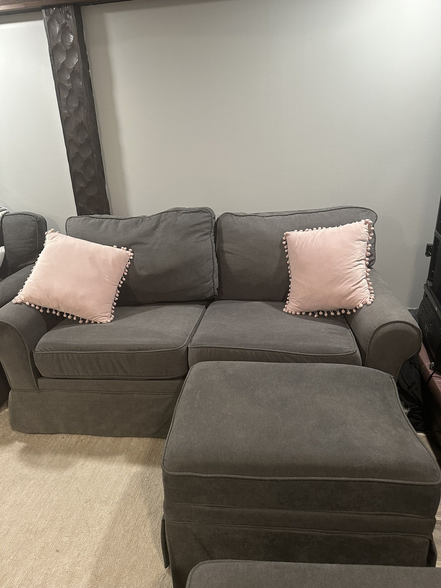 2 seater gray sofa with ottoman