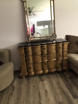 Buffet, chest, or entry with top black marble and velvet material inside