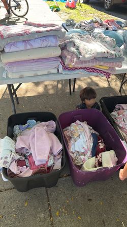 Garage sale tons of new baby clothes