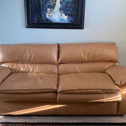 $75    Like New Tan Faux Leather Sleeper Couch 