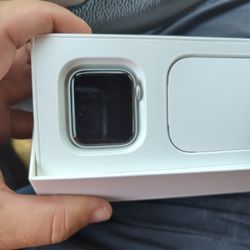 Apple Watch, iPhone, And MacBook Pro