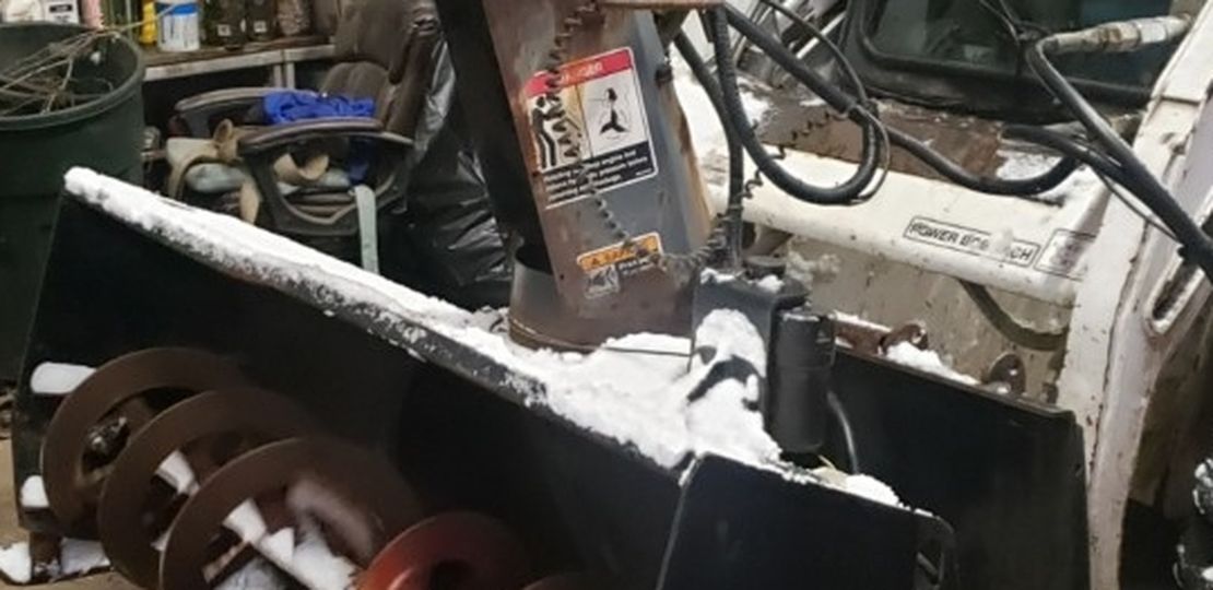 Skid Steer Snow Blower Attachment.