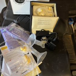 Medela Breast pump with accessories. Never used it was my daughter.