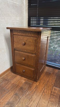Three drawer quarter-sawn oak end table