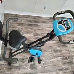 EXERCISE BIKE/ MONITOR WORKS/ADJUSTS TO DIFFERENT POSITIONS/FOLDS UP/REASONABLE OFFERS WELCOME 