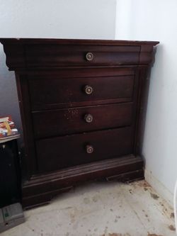 $8 A Mahogany Finish Nightstand