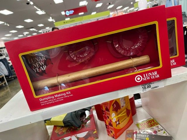Dumpling Making Kit includes rolling pin, silicone rolling mar, and 2 dumpling mold tools
