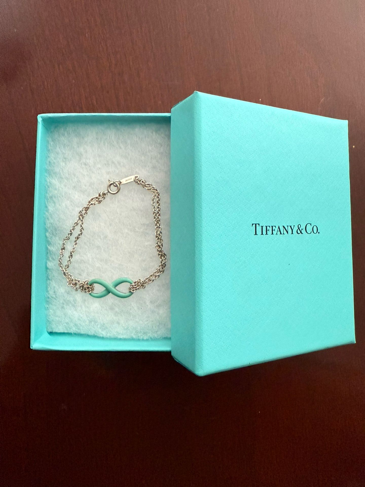 Tiffany’s Sterling Silver Blue Infinity Bracelet