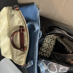 Box of designer purses
