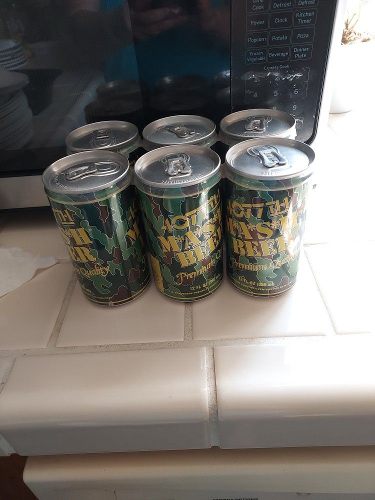 4077 VINTAGE TV SHOW "MASH"BEER CANS 12 OZ. 6 PK