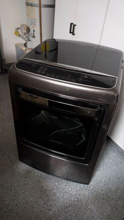 Practically new LG 7.3 cu. ft. Smart wi-fi Enabled Front Control Electric Dryer w/ EasyLoad™ Door