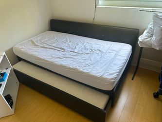 Twin bed with roll out trundle