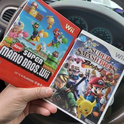 2 Nintendo Wii Games 
New Super Mario Bros 
And super smash Bros brawl