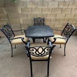 Patio Set. Table and chairs. All metal. Very Nice Condition.