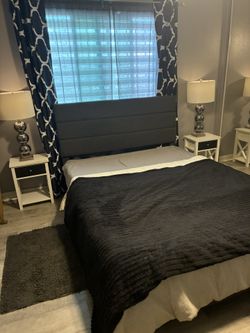 Full Sized Grey Bed With Great Modern Head Board