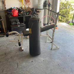 Weight Bench And Punching Bag
