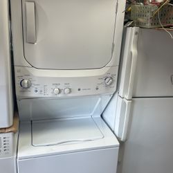 GE Washer And Dryer 220 Electric Stacked white .