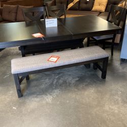 Table for chairs and bench for $1200 hurry only one to sell floor model close out cash only