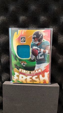 Travis Hunter Donruss Optic First Year Fresh RC Relic Card