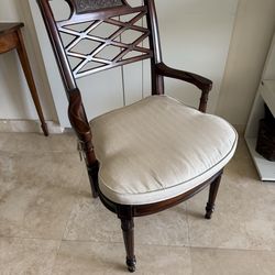 Wooden armchair carved crest