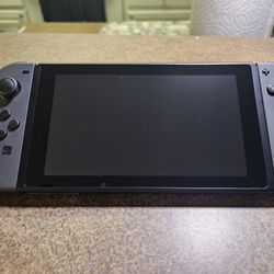 Nintendo Switch With Gray Joycons