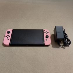 Nintendo Switch OLED W/ Pastel Pink Joy Cons (Like New)