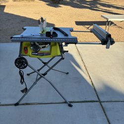 RYOBI 10 in. Corded Table Saw Extends And W/ Rolling Stand