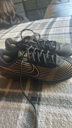 Black/gold softball cleats size 9.5