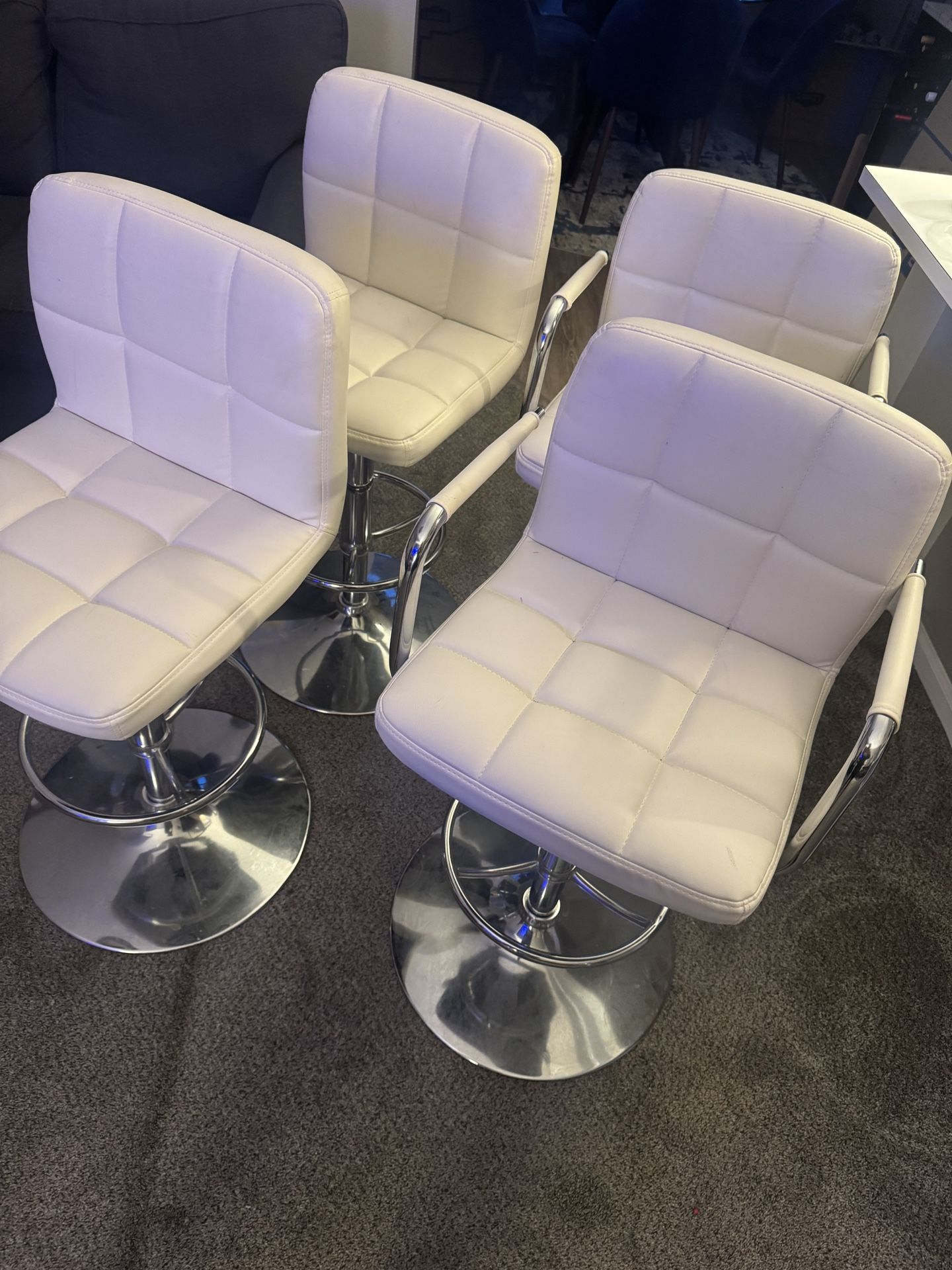 Four Swivel Barstools
